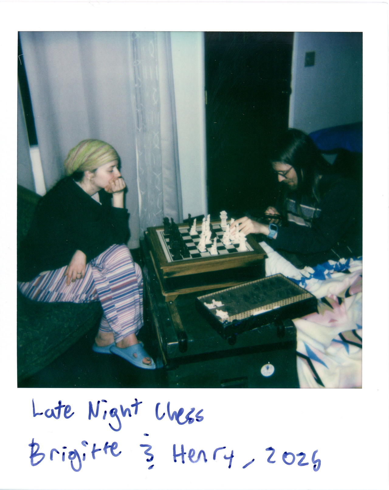 Brigitte and Henry play a late night game of Chess